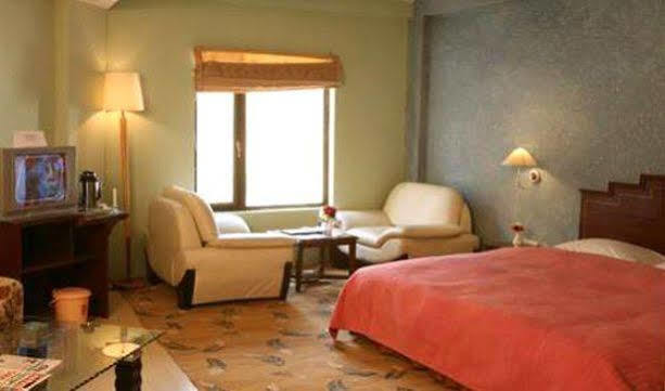 Hotel Sarovar Portico Badrinath Joshīmath Pokoj fotografie